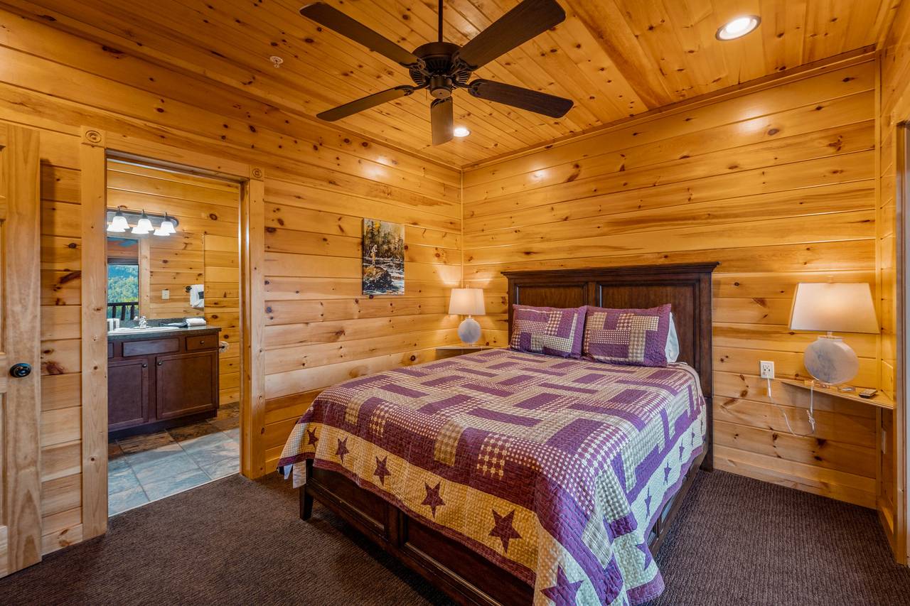 Bed 5: Lower level, queen, TV, deck entrance, ensuite full bath Bed 5: Lower level, queen, TV, deck entrance, ensuite full bath