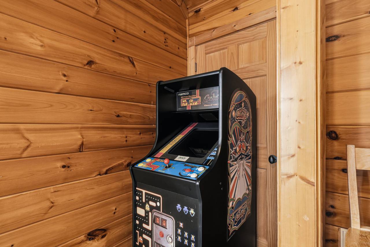 Game room with pool table, foosball & multi-cade arcade Game room with pool table, foosball & multi-cade arcade