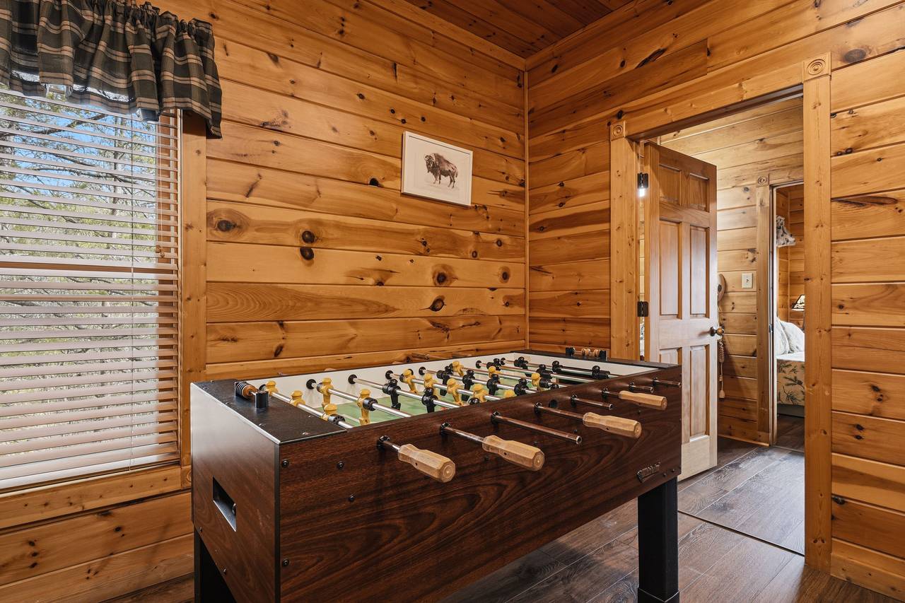 Game room with pool table, foosball & multi-cade arcade Game room with pool table, foosball & multi-cade arcade