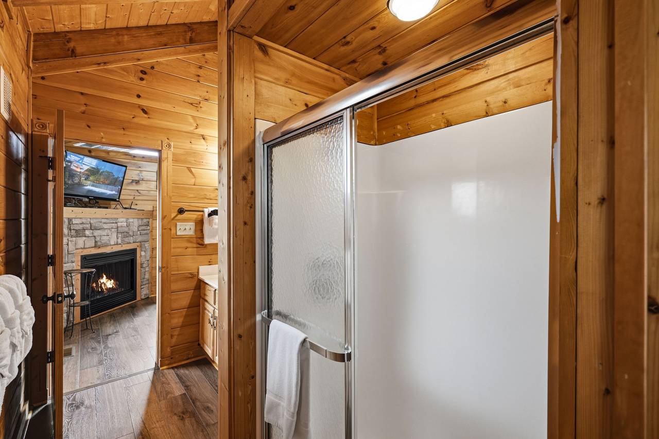 Entry-level full bath with standing shower and hair dryer Entry-level full bath with standing shower and hair dryer