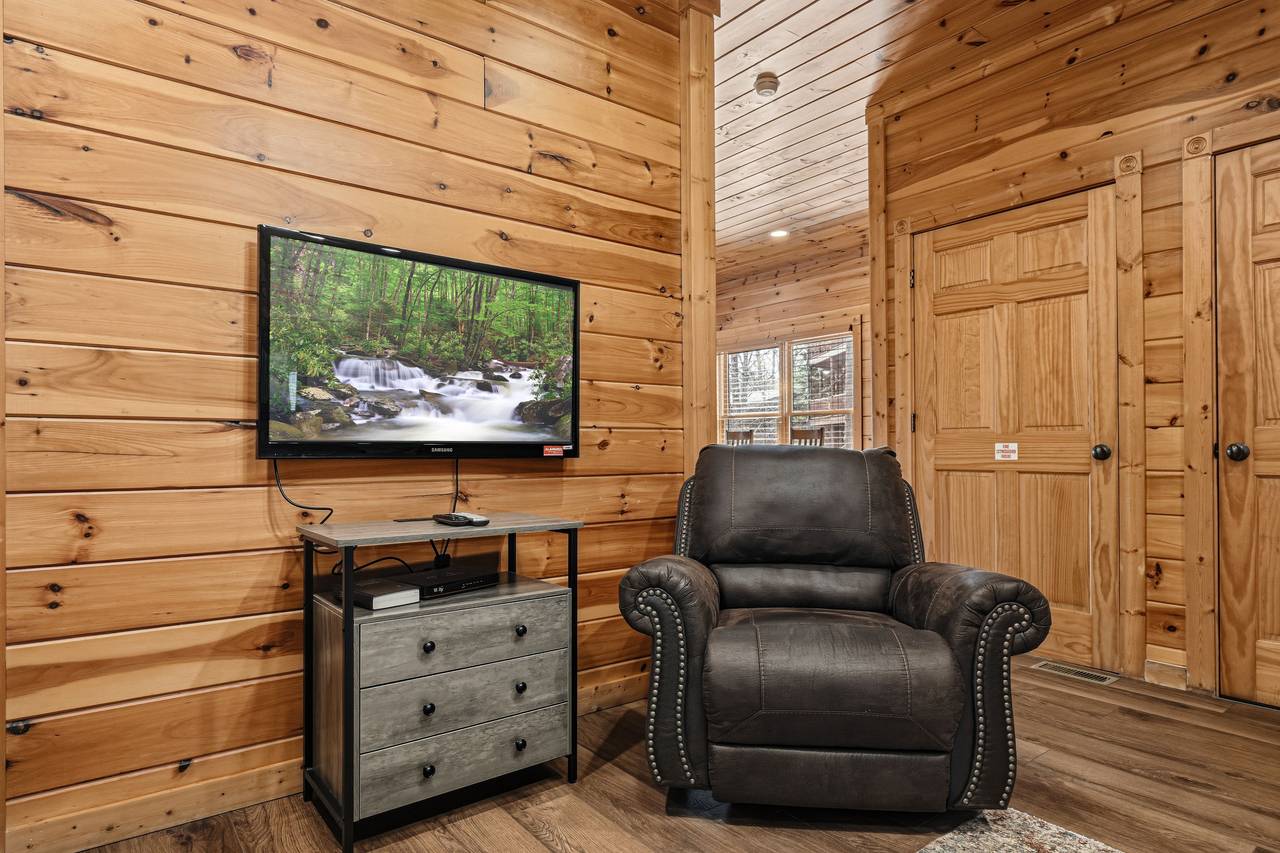 Lower-level living room with TV, recliner & sleeper sofa Lower-level living room with TV, recliner & sleeper sofa