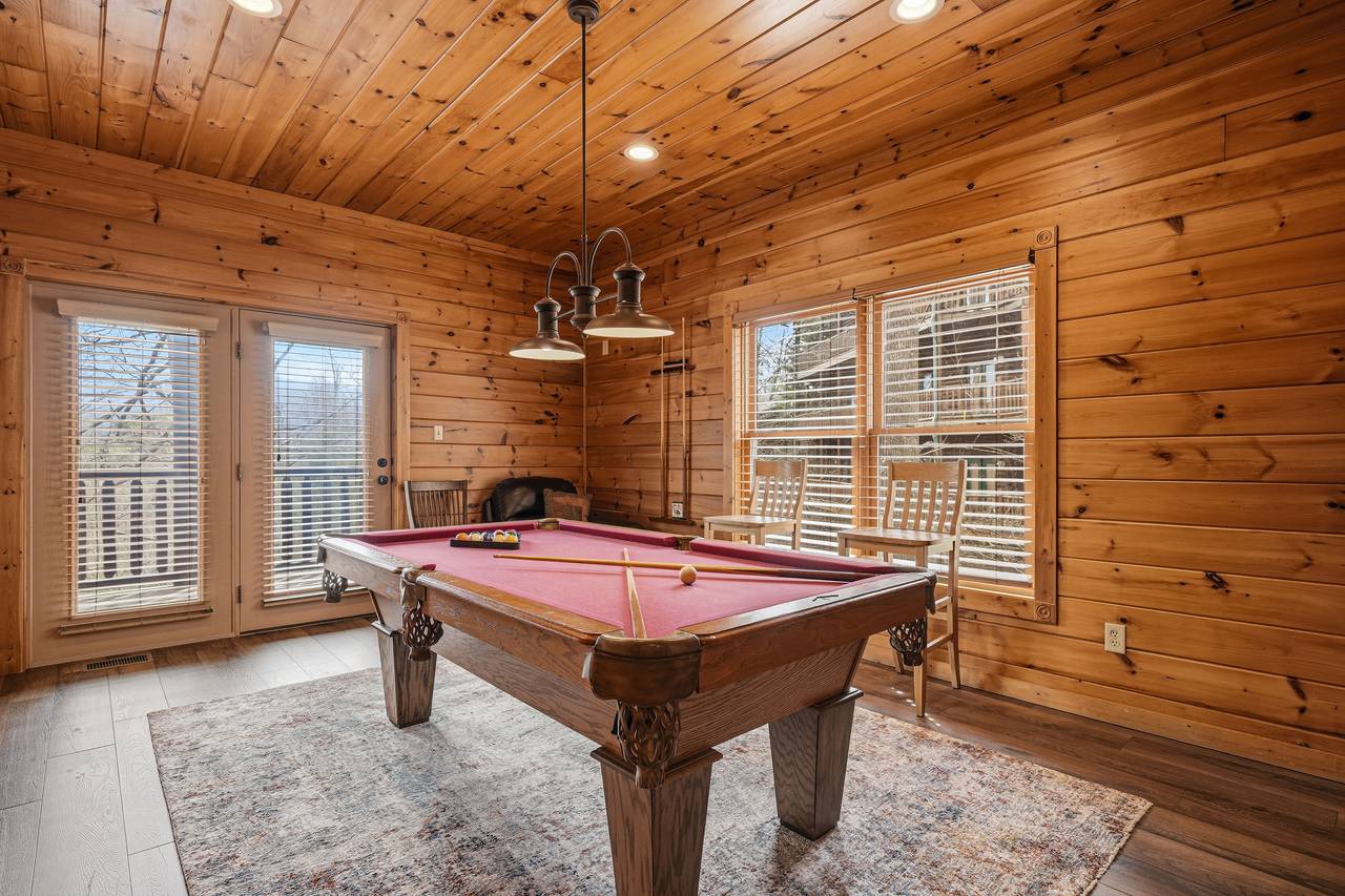 Game room with pool table, foosball & multi-cade arcade Game room with pool table, foosball & multi-cade arcade