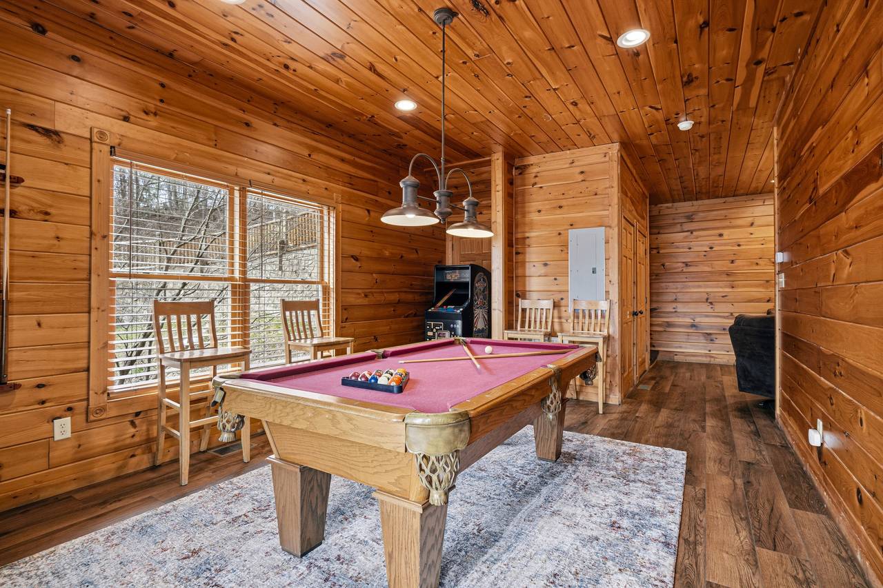 Game room with pool table, foosball & multi-cade arcade Game room with pool table, foosball & multi-cade arcade