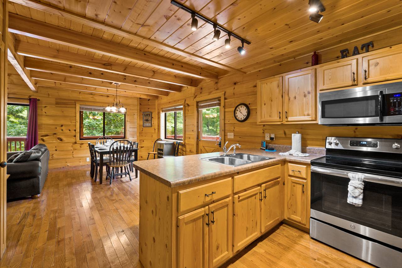 Kitchen island provides additional seating Kitchen island provides additional seating