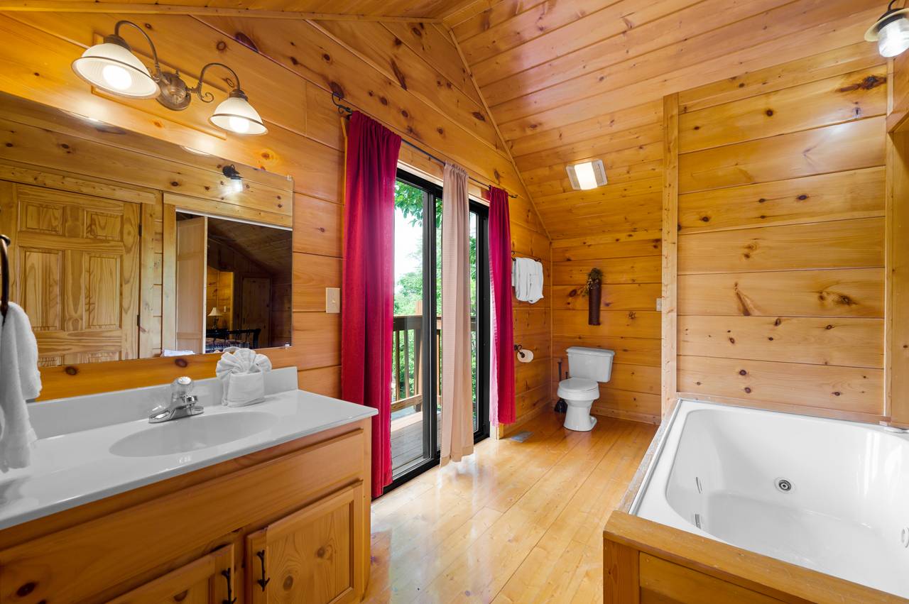 Upper level ensuite full bathroom with jacuzzi tub Upper level ensuite full bathroom with jacuzzi tub