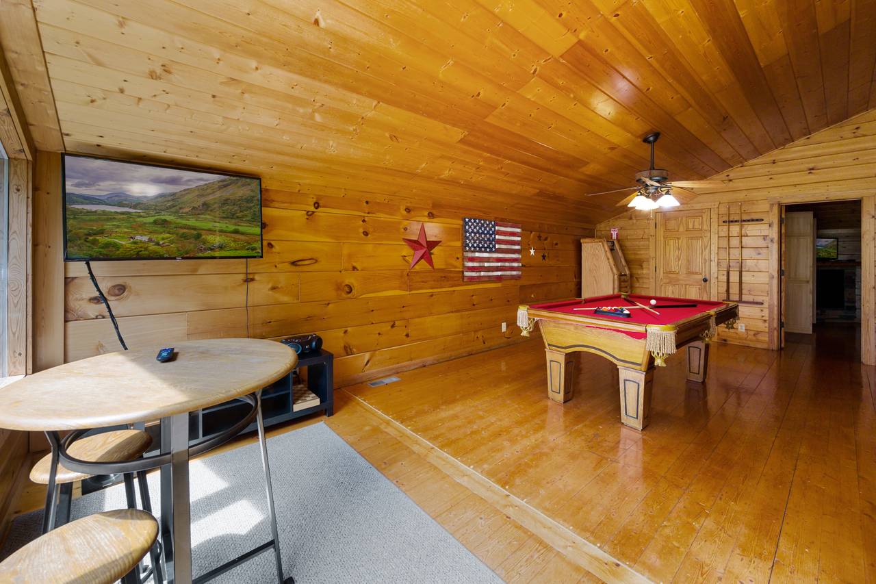 Loft game room with TV, pool table, multi-cade, & seating Loft game room with TV, pool table, multi-cade, & seating