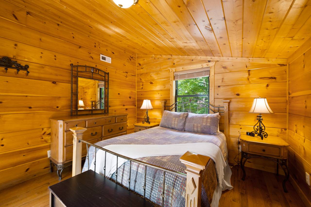 Bed 2: Queen bed with TV and deck entrance on main level Bed 2: Queen bed with TV and deck entrance on main level