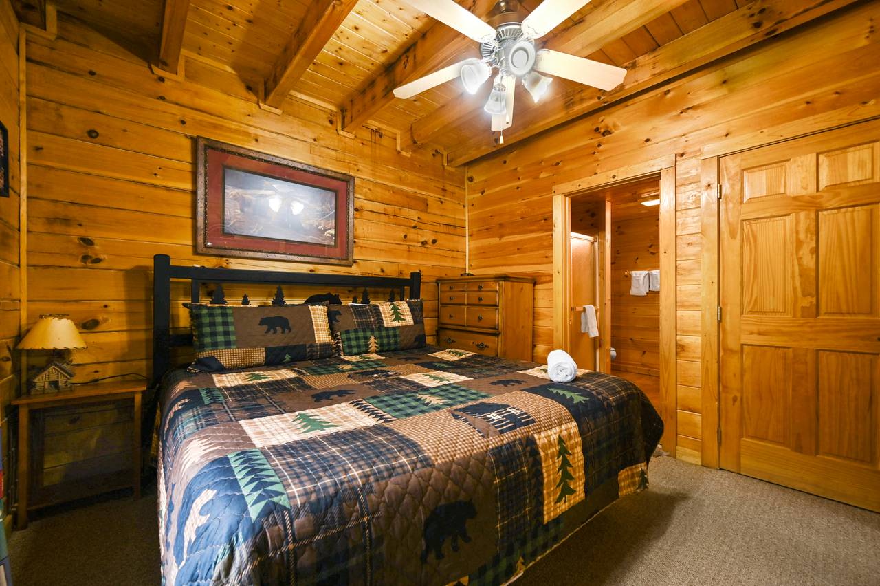 <span class="name">Main level king bedroom with ensuite full bathroom.</span> <span class="name">Main level king bedroom with ensuite full bathroom.</span>
