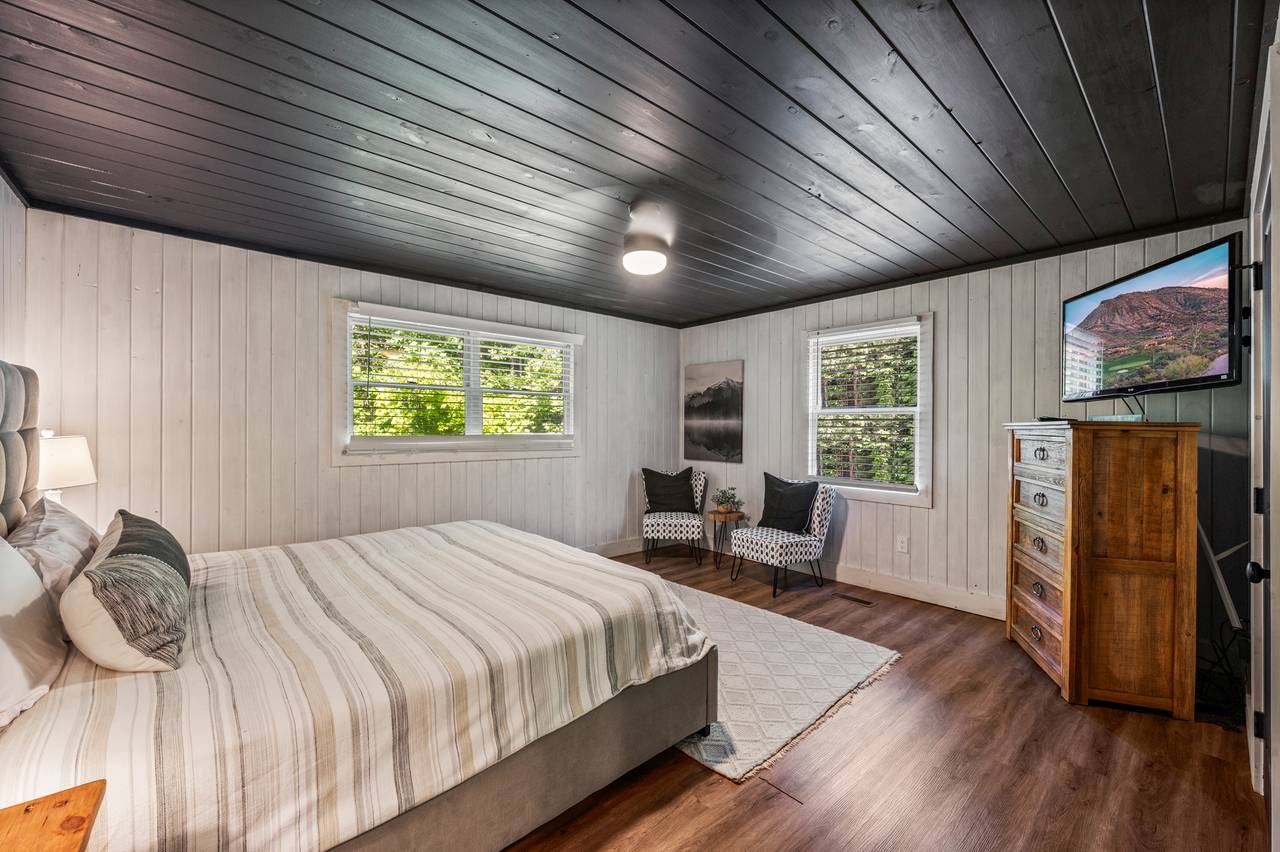 Main floor bedroom with king bed Main floor bedroom with king bed