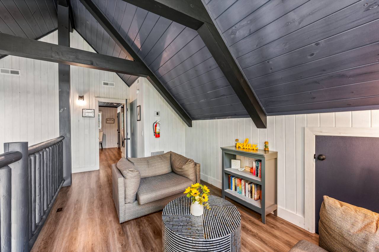 Cozy reading nook with floor-to-ceiling windows Cozy reading nook with floor-to-ceiling windows