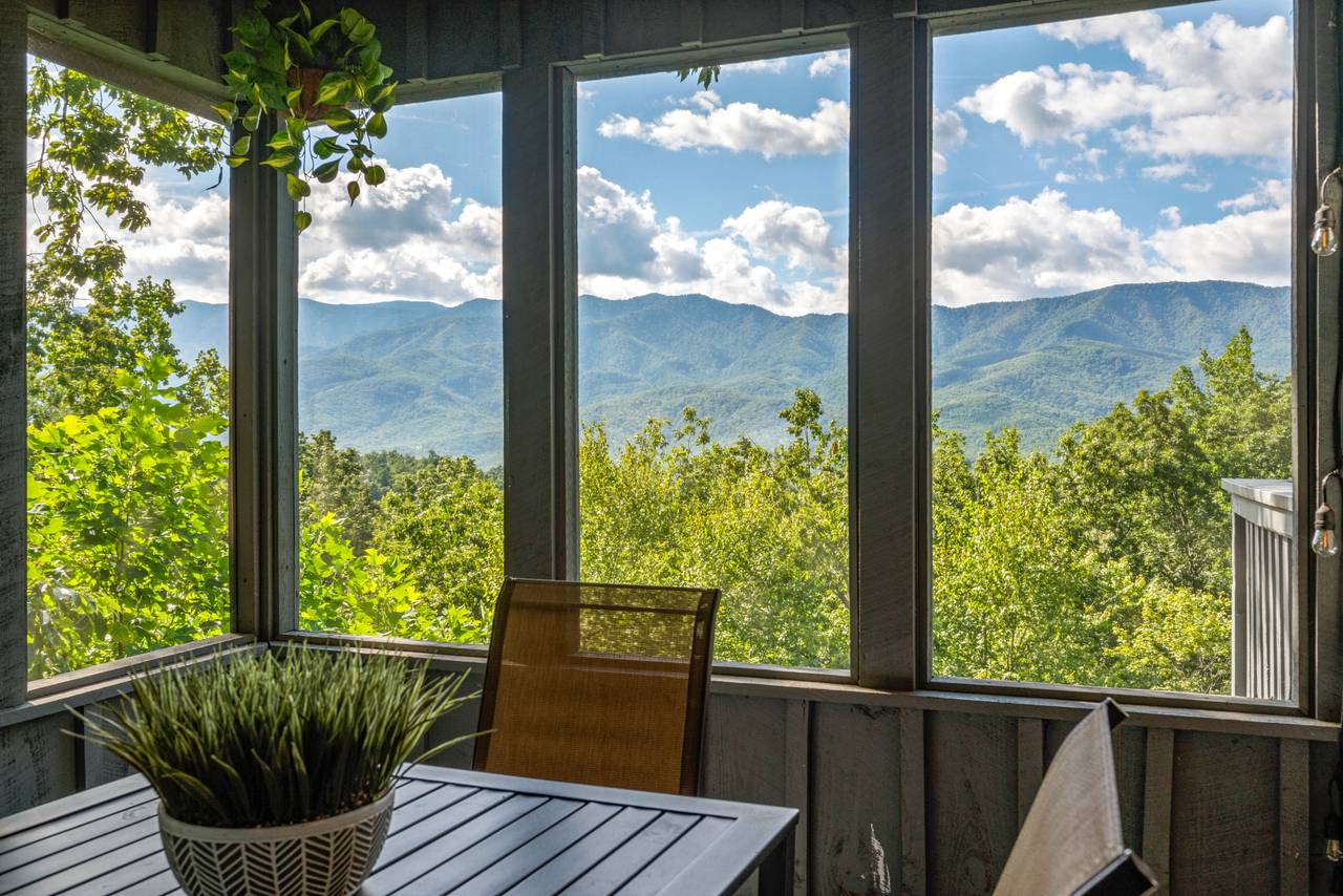 Screened porch with relaxing seating Screened porch with relaxing seating