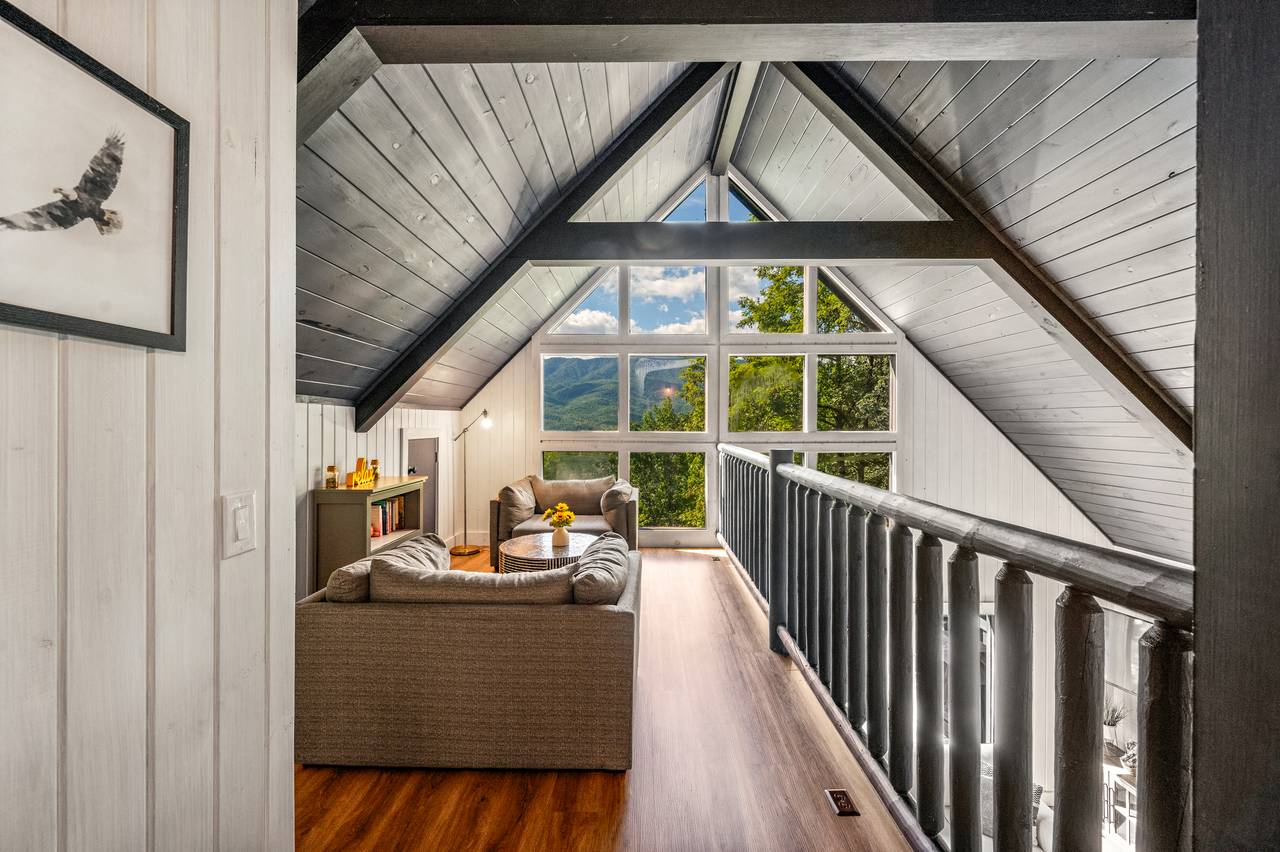 Cozy reading nook with floor-to-ceiling windows Cozy reading nook with floor-to-ceiling windows