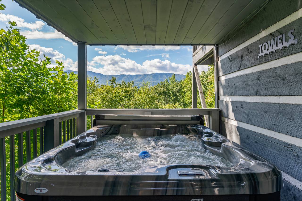 Private hot tub with mountain backdrop Private hot tub with mountain backdrop