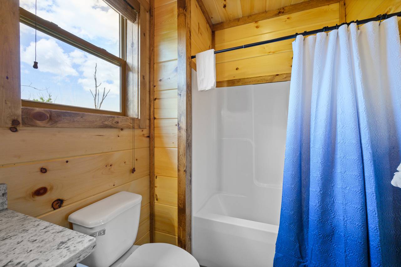 Bedroom 1 Full bathroom with tub/shower combo Bedroom 1 Full bathroom with tub/shower combo