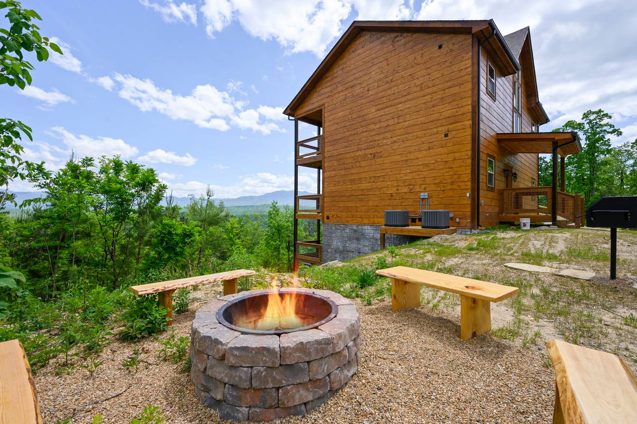 Enjoy a campfire under the stars & cookout on park-style grill Enjoy a campfire under the stars & cookout on park-style grill