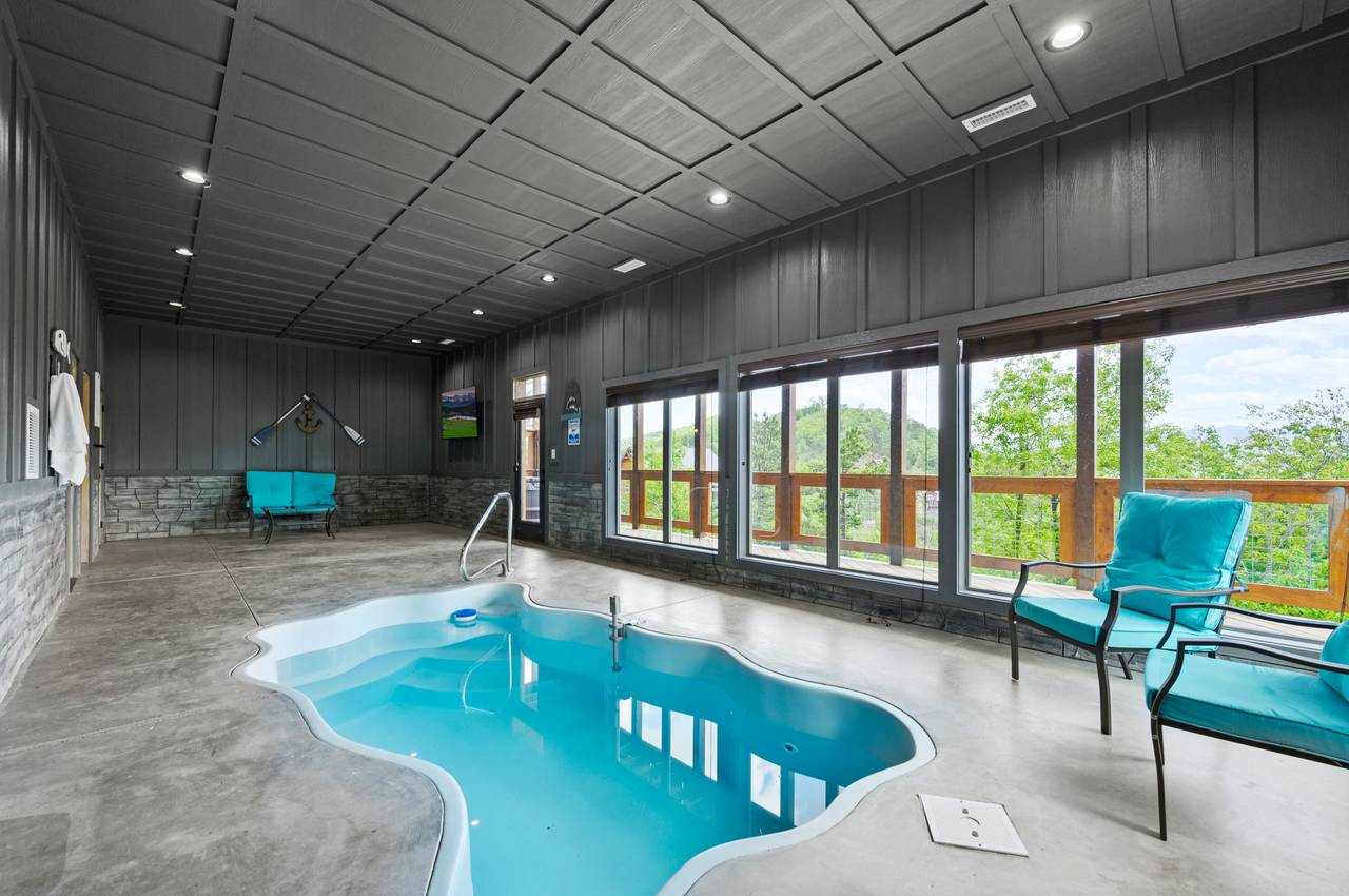 Lower level swimming pool with seating. Lower level swimming pool with seating.