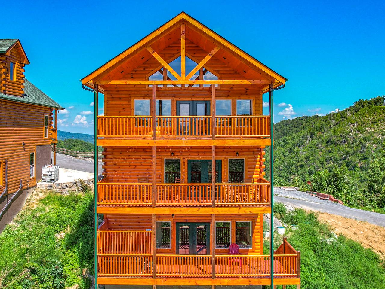 Enjoy 3 decks with hot tub and outdoor seating Enjoy 3 decks with hot tub and outdoor seating