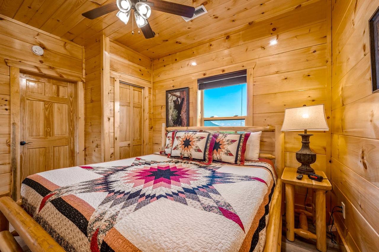 Bed 1: Main Level, King Bed, TV, and En-Suite Full Bathroom Bed 1: Main Level, King Bed, TV, and En-Suite Full Bathroom