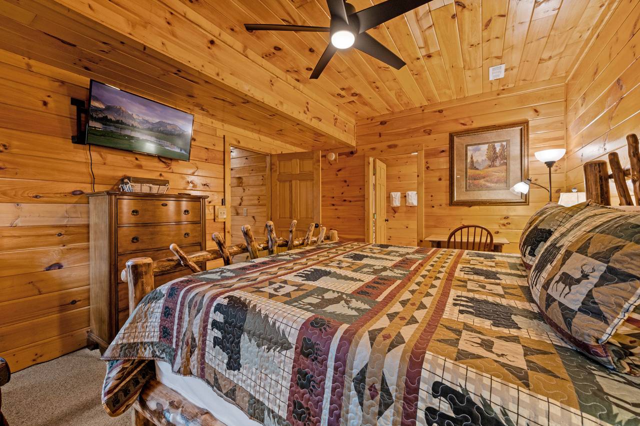Bed 1: King with remote work station, TV, and en-suite full bath Bed 1: King with remote work station, TV, and en-suite full bath