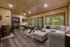 Lower level game room with pool table, arcade game, & bunk  Lower level game room with pool table, arcade game, & bunk
