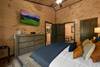 Bedroom 1: Main level, king bed, TV, ensuite bath & jetted tub Bedroom 1: Main level, king bed, TV, ensuite bath & jetted tub
