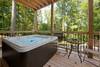 Relax in the secluded and private hot tub on the back deck. Relax in the secluded and private hot tub on the back deck.