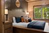 Bedroom 1: Main level, king bed, TV, ensuite bath & jetted tub Bedroom 1: Main level, king bed, TV, ensuite bath & jetted tub