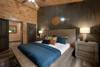 Bedroom 1: Main level, king bed, TV, ensuite bath & jetted tub Bedroom 1: Main level, king bed, TV, ensuite bath & jetted tub