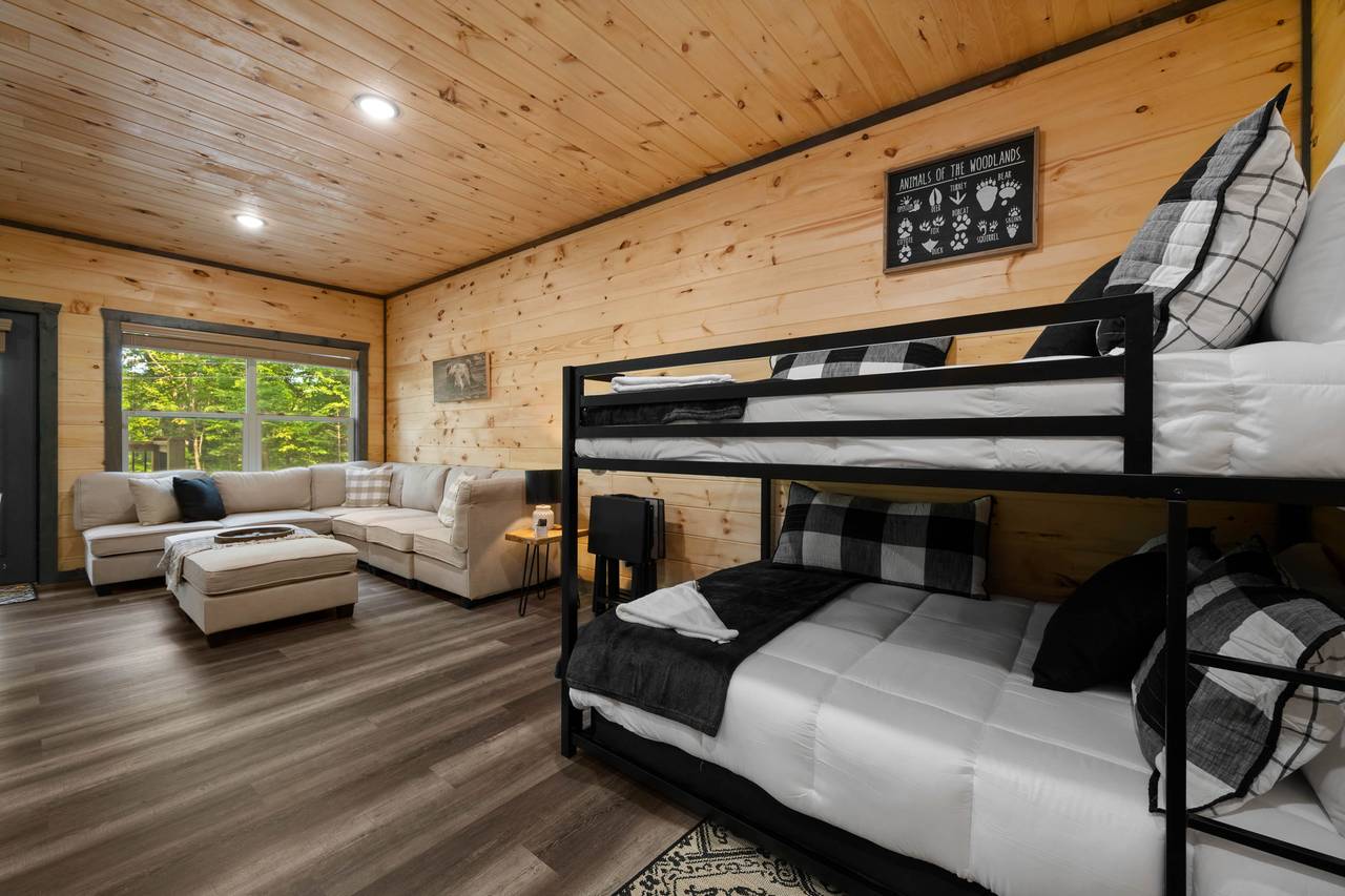 Full over full bunk bed in lower level game room Full over full bunk bed in lower level game room