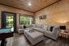 Lower level game room with comfy sofa and TV Lower level game room with comfy sofa and TV