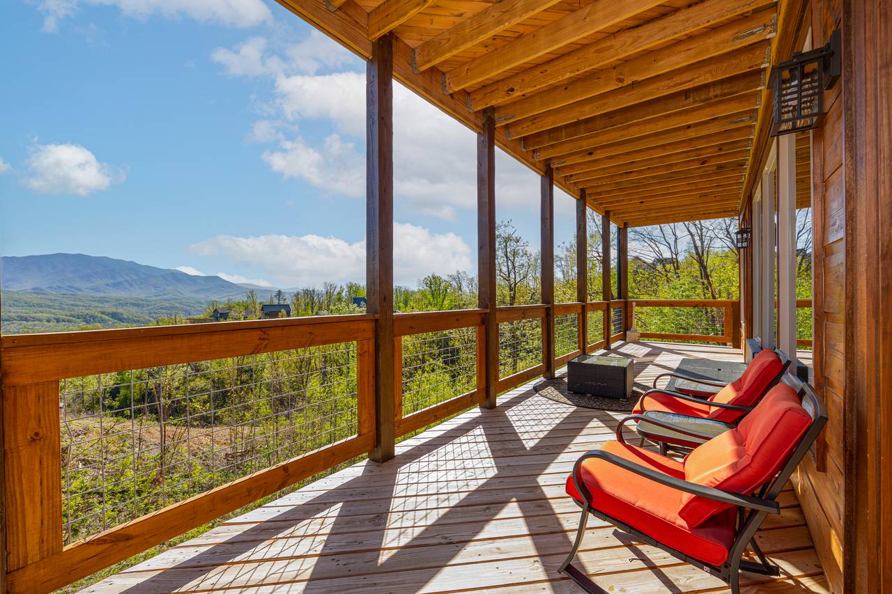 Upper level deck seating with beautiful views of the Smokies! Upper level deck seating with beautiful views of the Smokies!