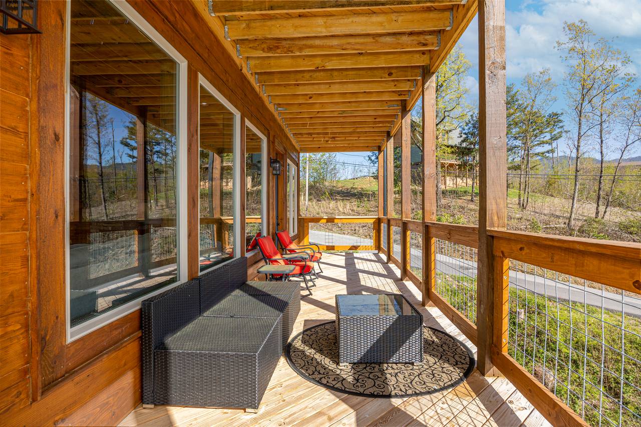 Upper level deck seating with beautiful views of the Smokies! Upper level deck seating with beautiful views of the Smokies!