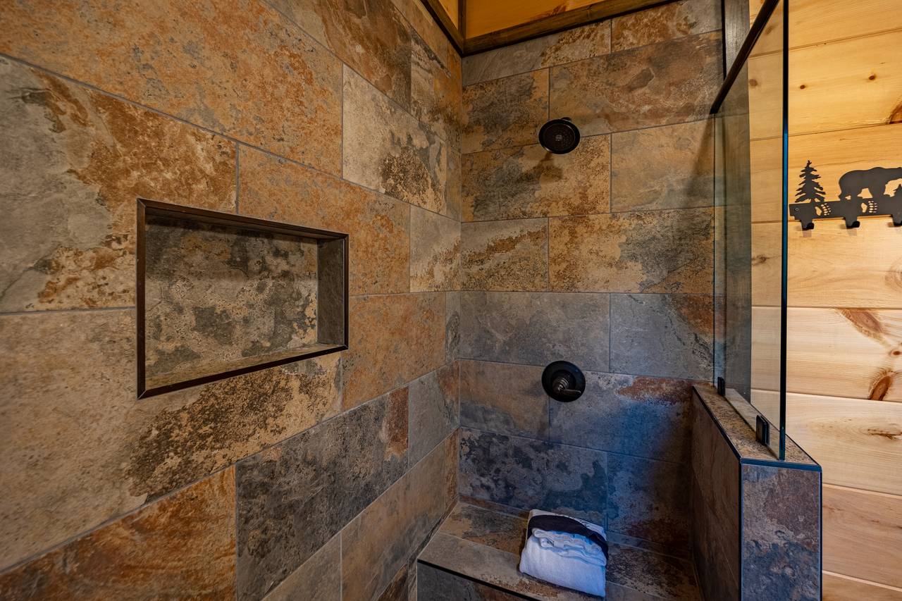 Bathroom 1: Entry level en-suite bath w/dual head walk-in shower Bathroom 1: Entry level en-suite bath w/dual head walk-in shower