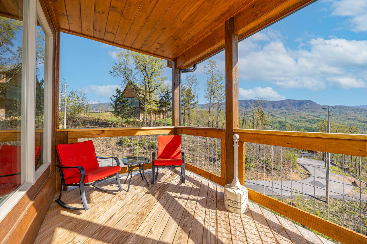 Upper level deck seating with beautiful views of the Smokies! Upper level deck seating with beautiful views of the Smokies!