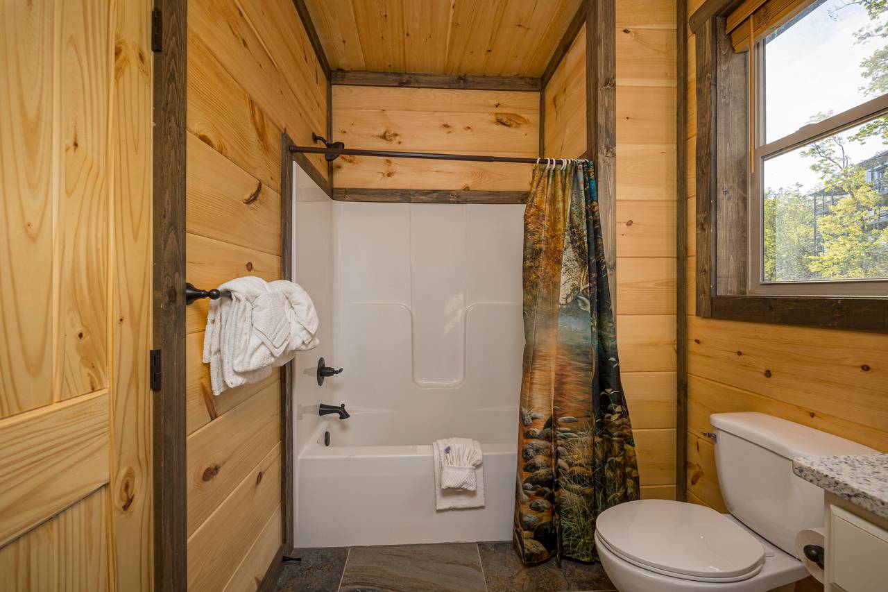 Bathroom 3: ensuite full bath with tub shower combo Bathroom 3: ensuite full bath with tub shower combo