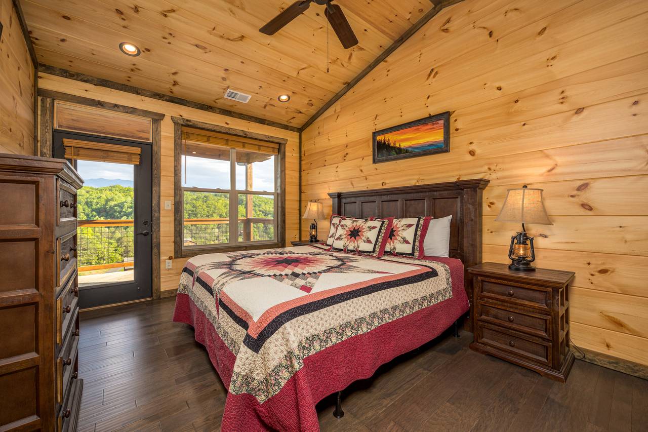 Bed 3: upper level king, TV, ensuite full bath, & deck access Bed 3: upper level king, TV, ensuite full bath, & deck access