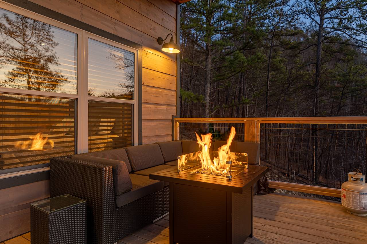 Cozy up by the outdoor fireplace Cozy up by the outdoor fireplace