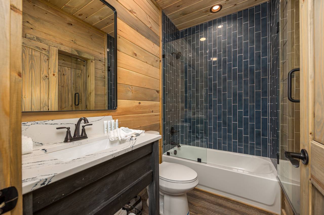 En-suite full bathroom with tub and shower combo En-suite full bathroom with tub and shower combo