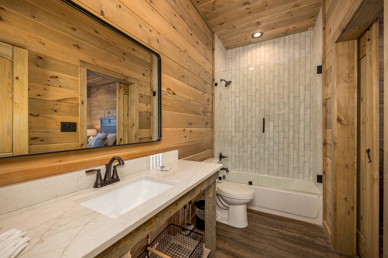 En-suite full bathroom with tub shower combo En-suite full bathroom with tub shower combo