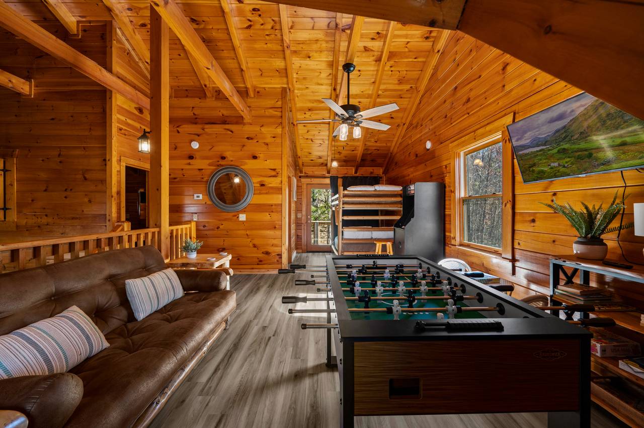 Upper level game room with full bunk bed and queen futon Upper level game room with full bunk bed and queen futon