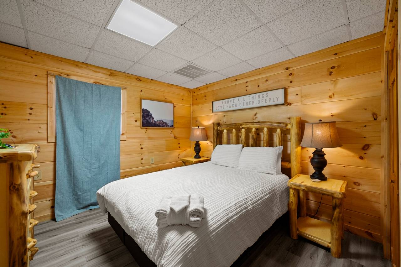 Lower level queen bed with TV Lower level queen bed with TV