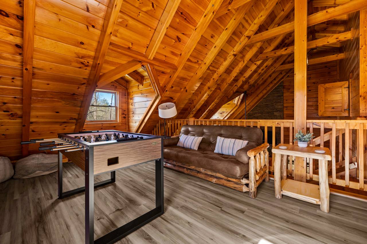 Upper level game room with queen futon Upper level game room with queen futon