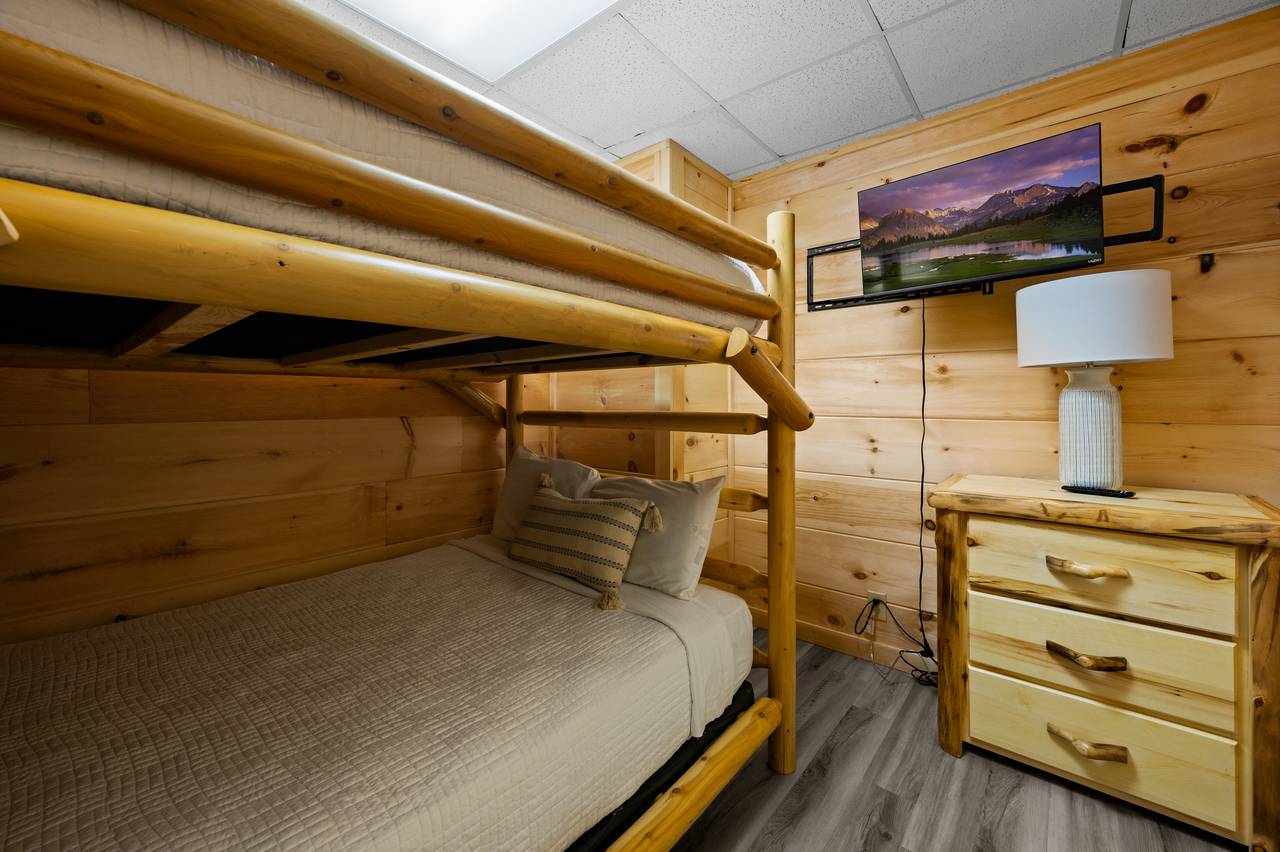 Lower level full over full bunk bedroom with TV Lower level full over full bunk bedroom with TV