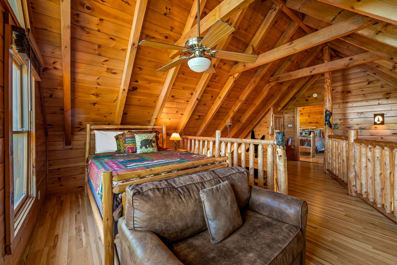 Bed 2: Queen in loft with, loveseat, TV, & arcade game Bed 2: Queen in loft with, loveseat, TV, & arcade game