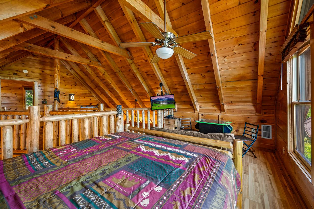 Bed 2: Queen in loft with, loveseat, TV, & arcade game Bed 2: Queen in loft with, loveseat, TV, & arcade game