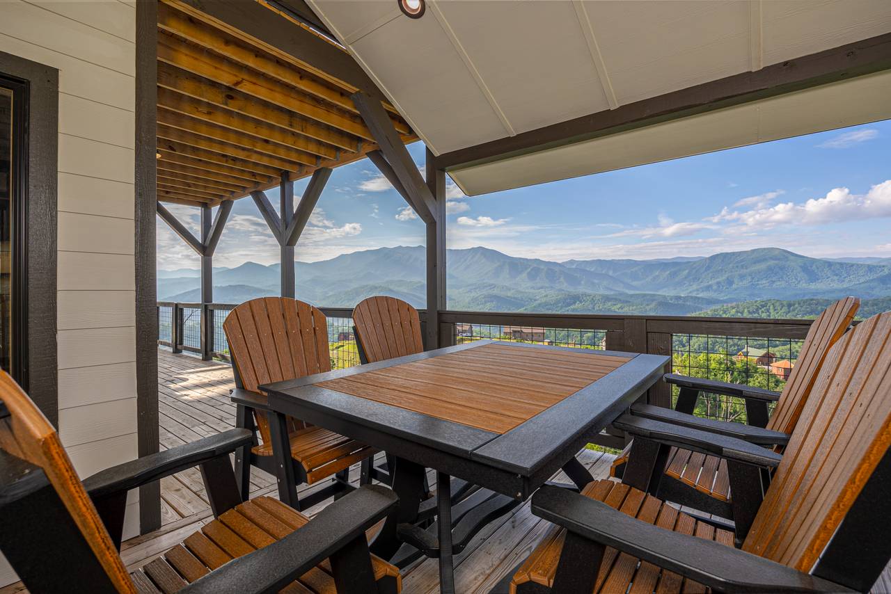 Outdoor fireplace, dining, and TV for entertainment. Outdoor fireplace, dining, and TV for entertainment.