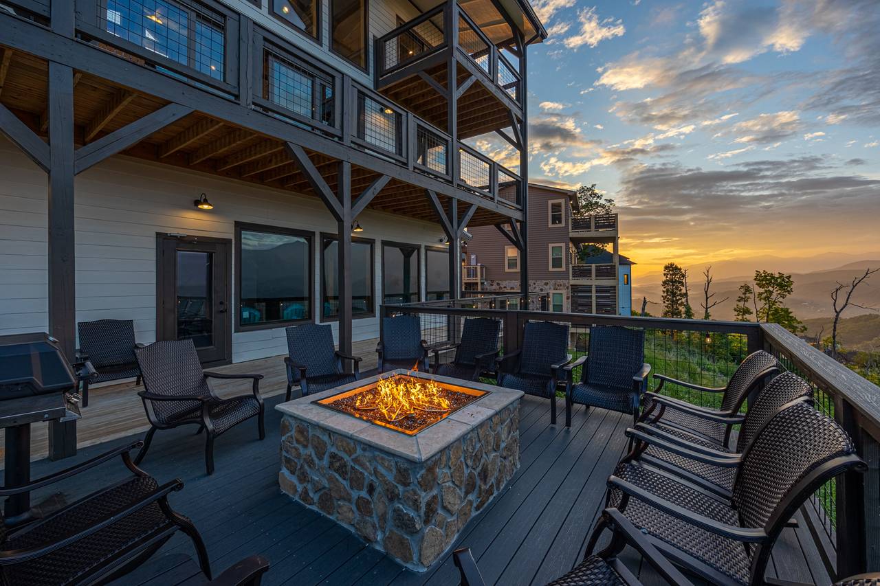 Sit by the gas firepit on the lower deck & take in the views! Sit by the gas firepit on the lower deck & take in the views!
