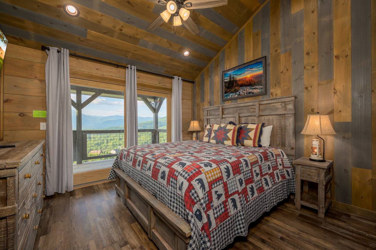 Bed 3: upper level, king with deck access, TV, & ensuite full ba Bed 3: upper level, king with deck access, TV, & ensuite full ba