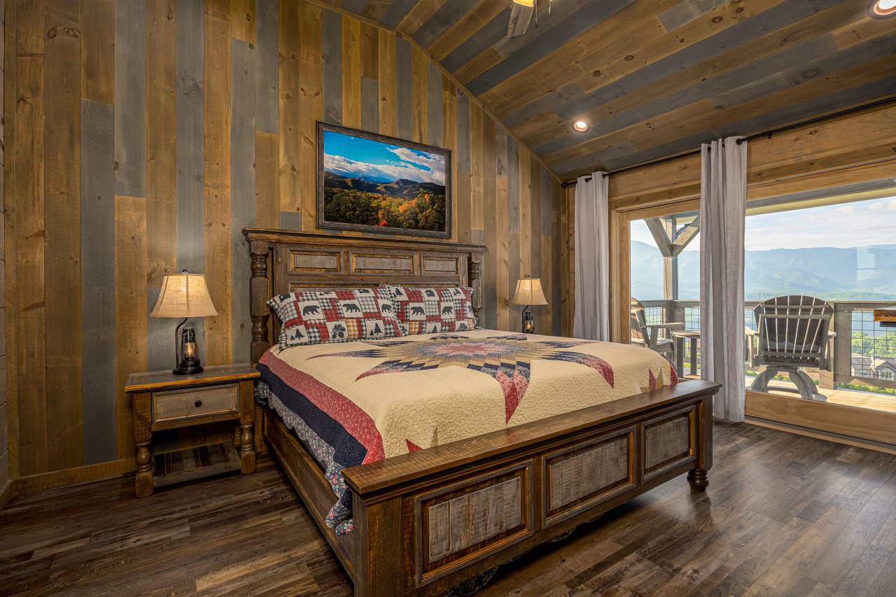 Bed 2: upper level, king with deck access, TV, & ensuite full ba Bed 2: upper level, king with deck access, TV, & ensuite full ba