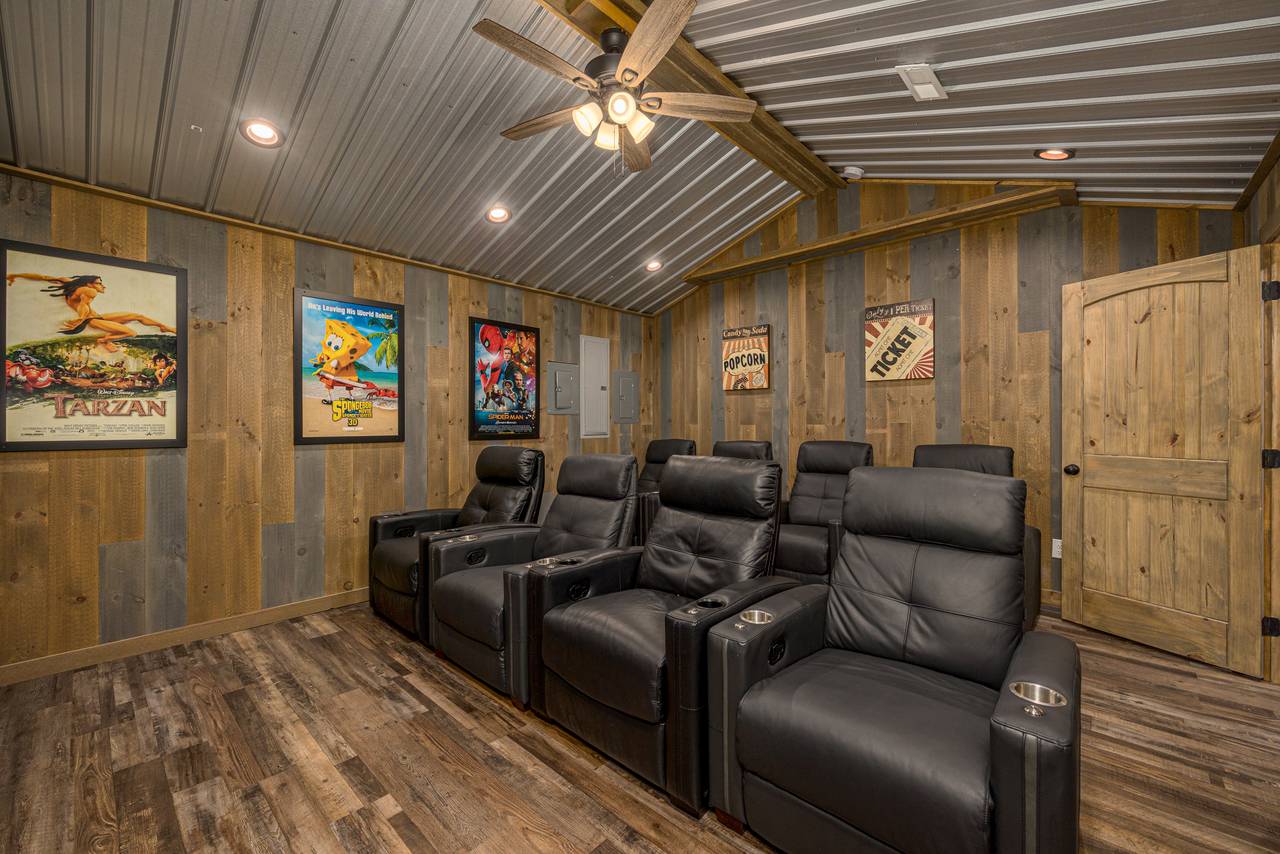 Lower level movie theater with cushy seating Lower level movie theater with cushy seating